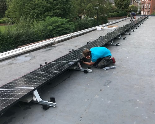 Mounting solar panels on flat roof south facing